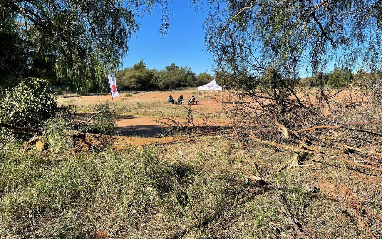 The same area opened up after clearing, with the INERCA marquee pitched on the far side